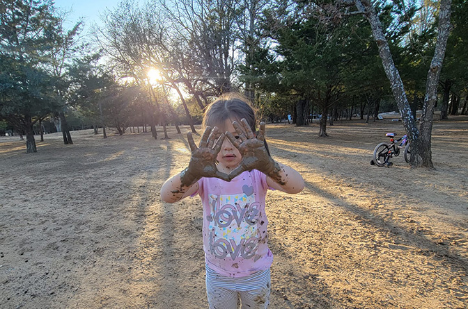 Kid Playing with Mud
