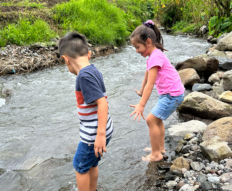 Children Learning by the River