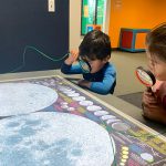 Kids with Magnifying Glass